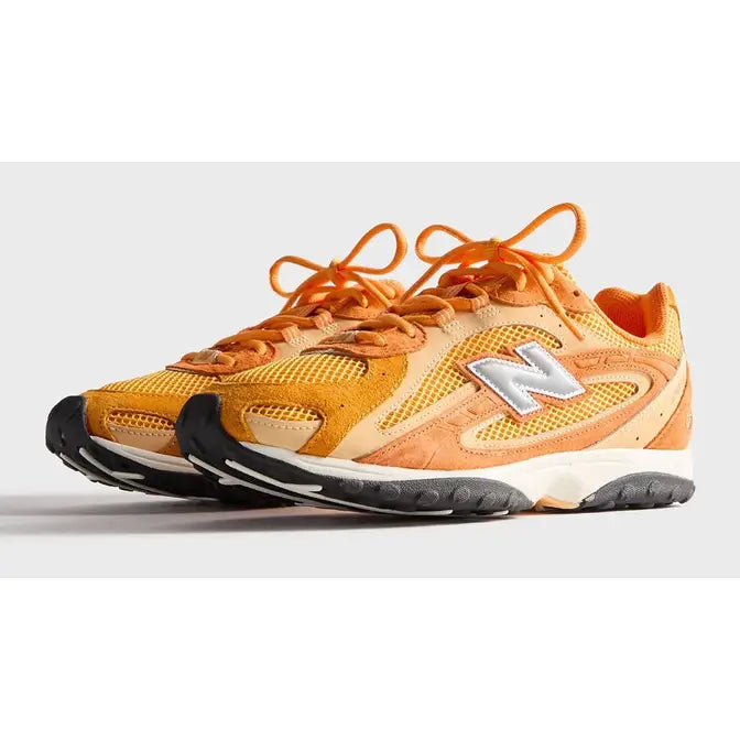 KITH x New Balance 204L Sunburst Orange